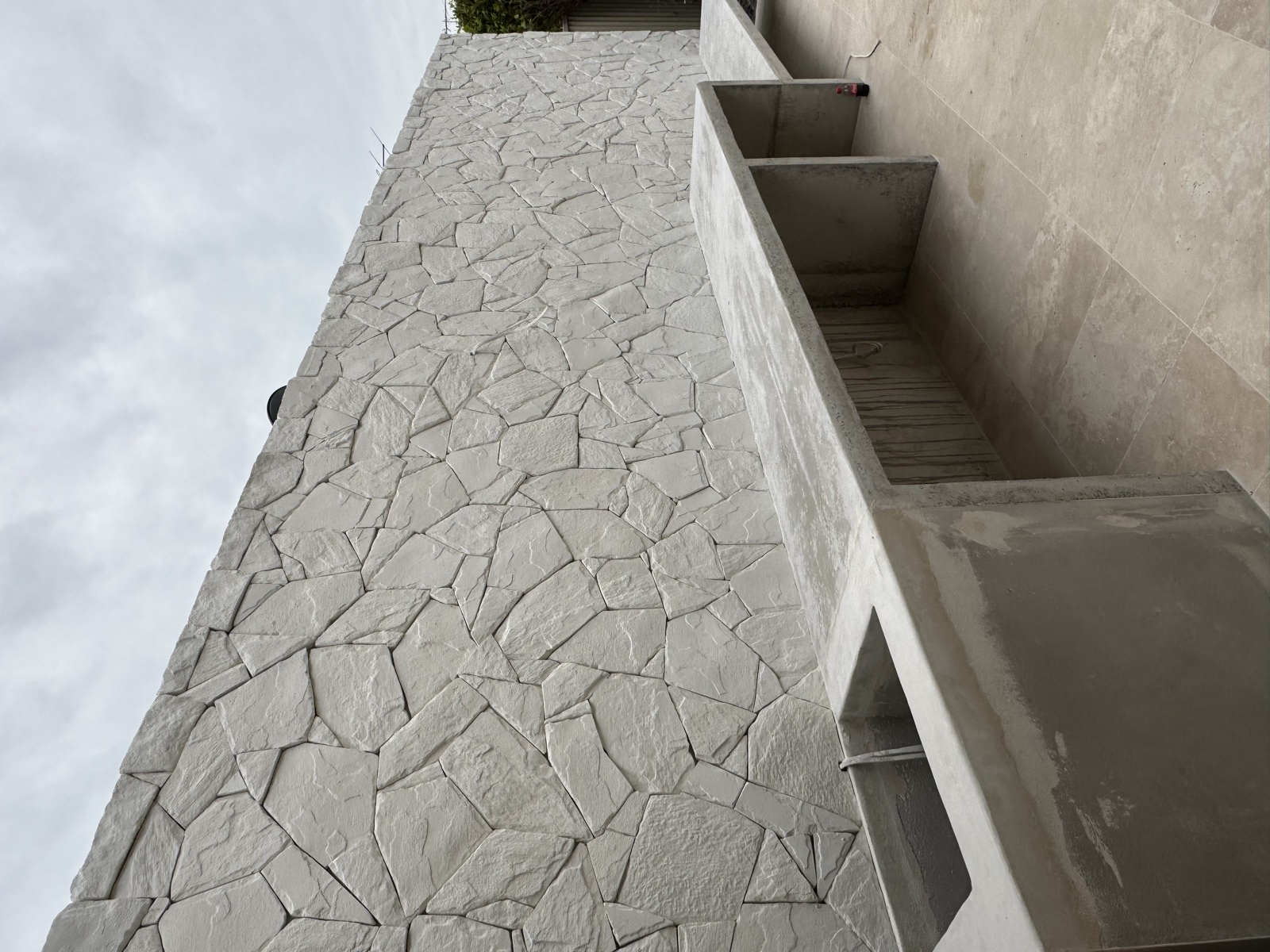 Crazy paving stone pool surround, Rong Xiang Tilers