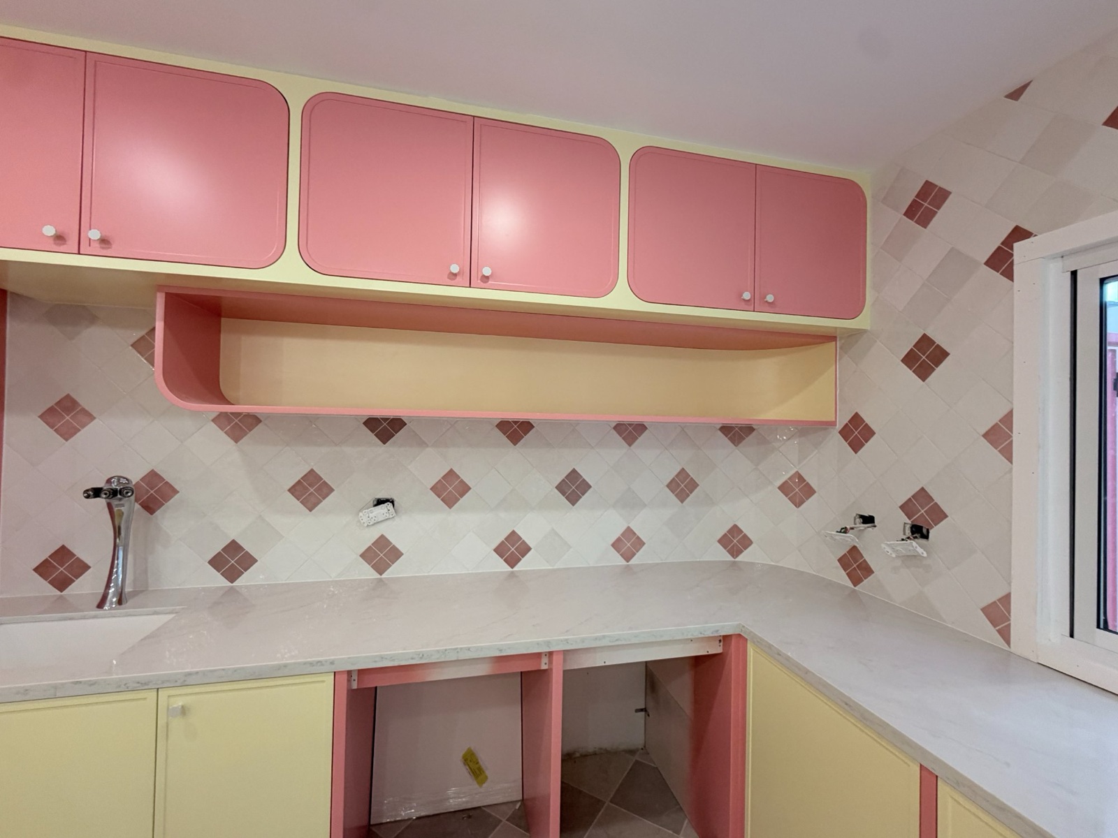 Pink kitchen diamond pattern backsplash tiling with custom cabinetry, Rong Xiang Tilers