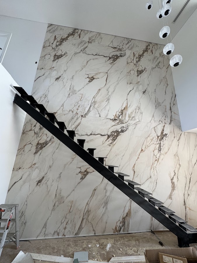 Large-format marble feature wall installation, Rong Xiang Tilers