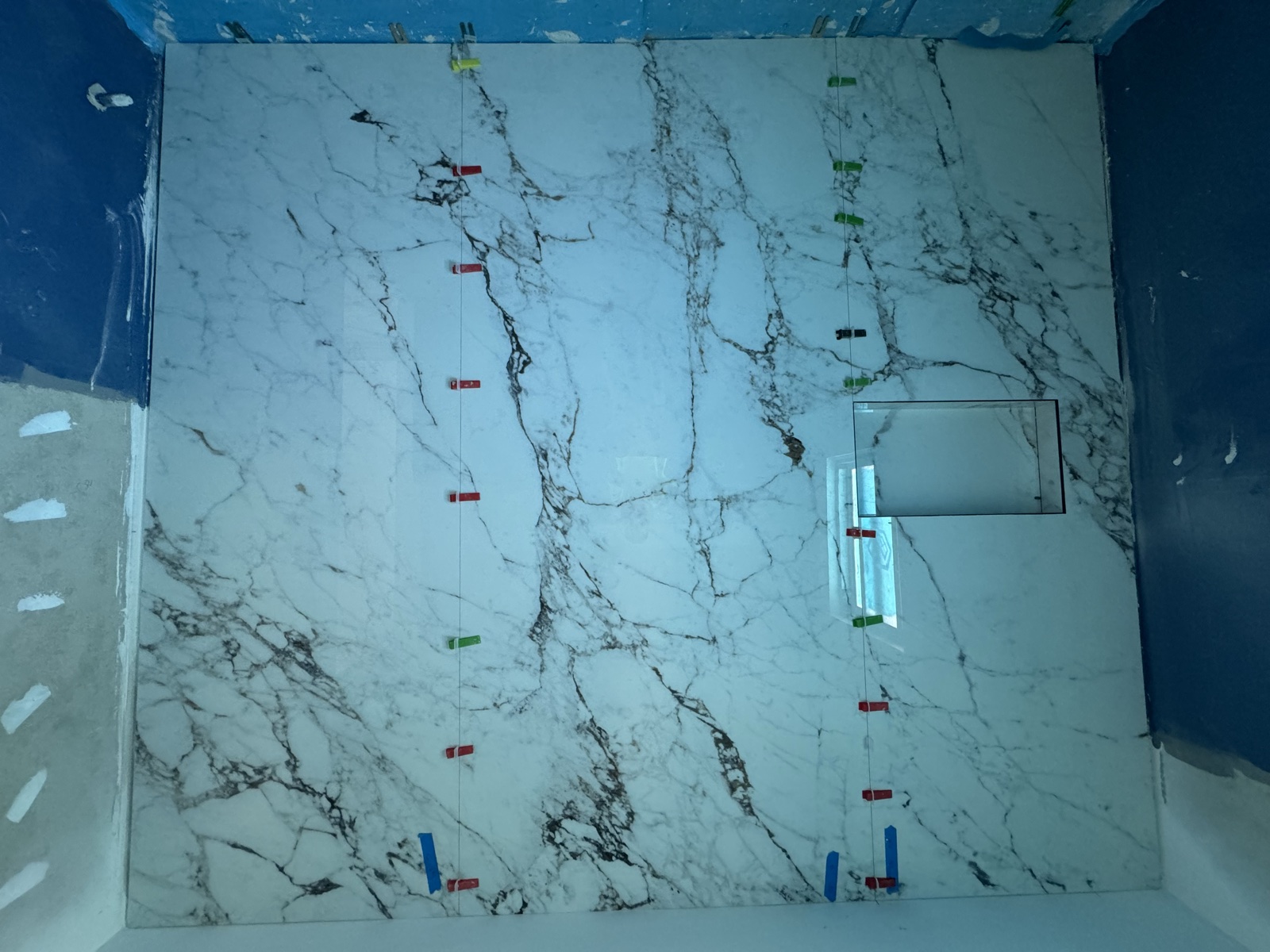 Large-format marble wall tiling with spacers, Rong Xiang Tilers