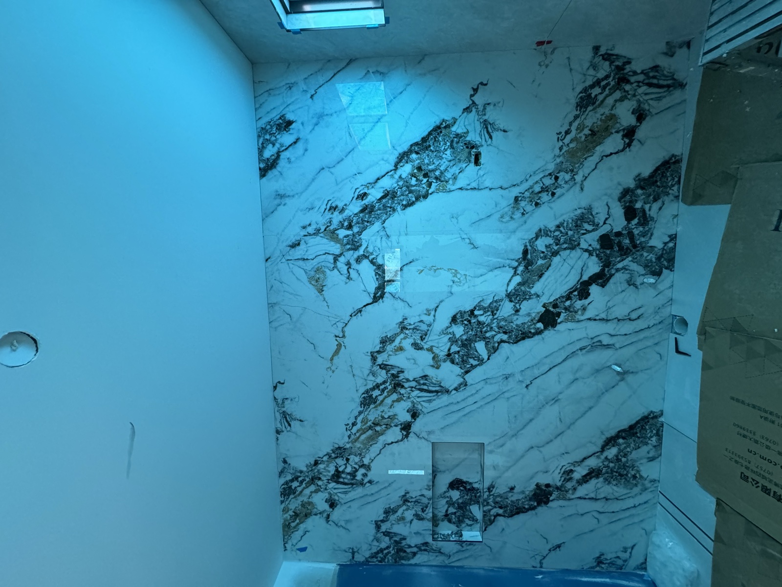 Feature marble wall and grey floor tiling, Rong Xiang Tilers